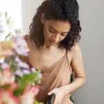 A woman watering plants