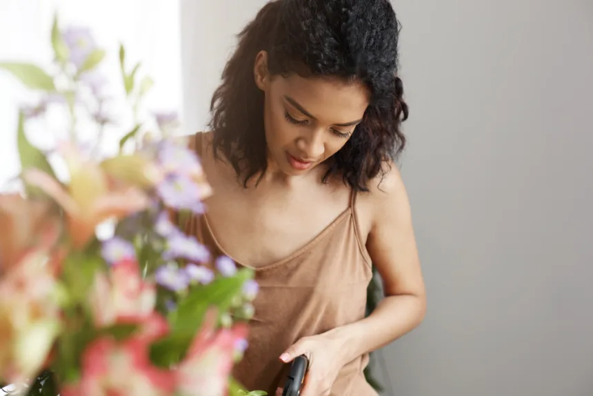 A woman watering plants