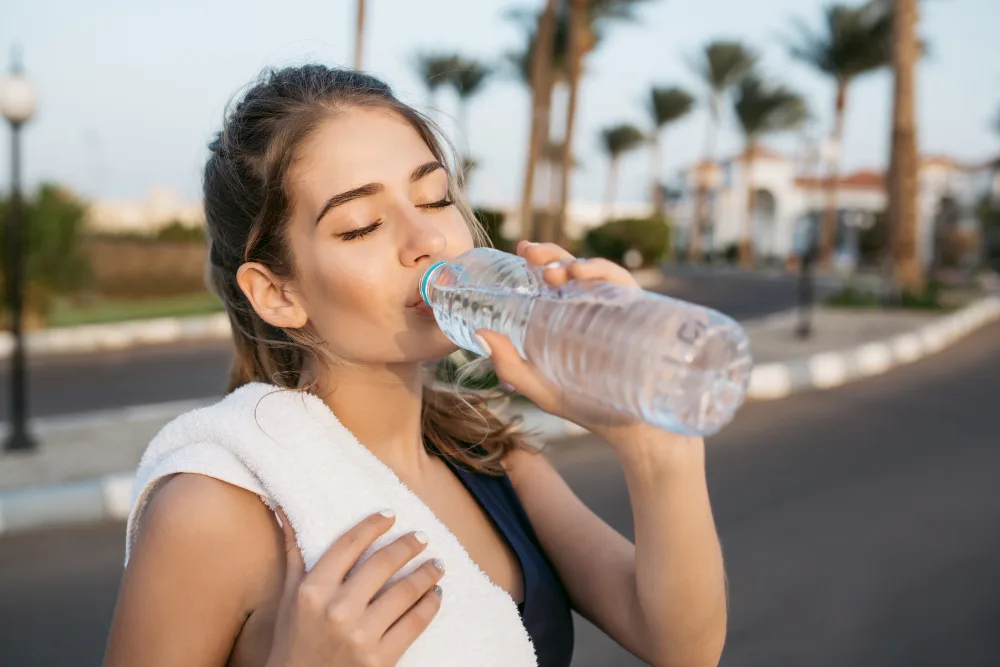 A woman drinking water