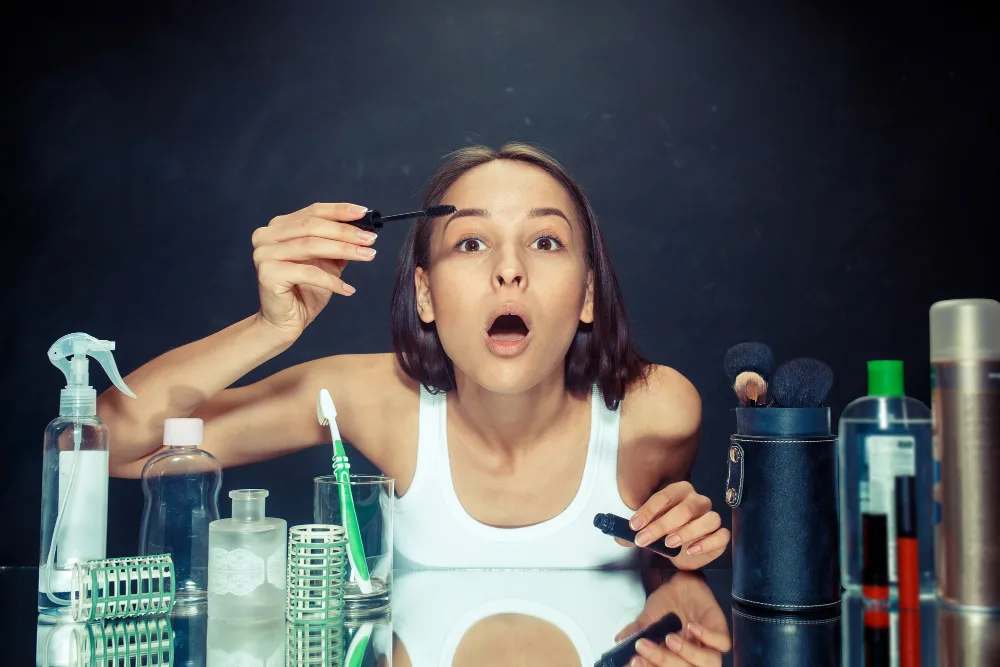 An image of a woman applying make-up