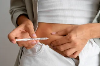 image of a woman injecting hormones